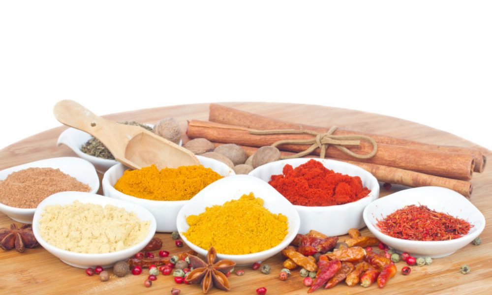 colorful-plates-of-spices-with-copy-space-picture-id478213323